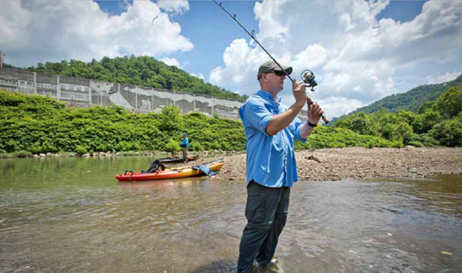 Man Fishing the Tug