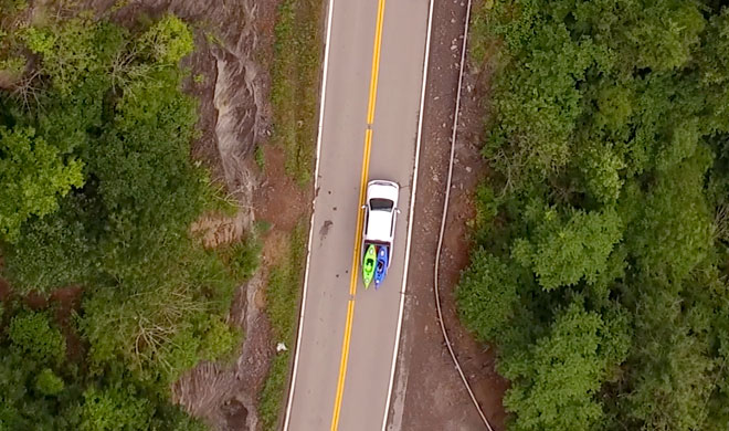 Truck with canoes on a road